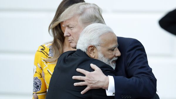Indian Prime Minister Narendra Modi hugs President Donald Trump as Modi departs the White House, Monday, June 26, 2017, in Washington. - اسپوتنیک افغانستان  
