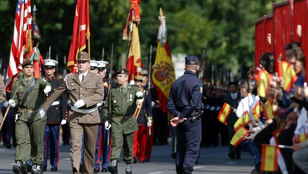 United States and NATO soldiers parade with Spanish armed forces during the National Day Parade in Madrid - اسپوتنیک افغانستان  