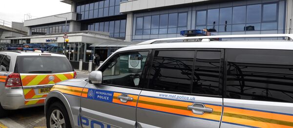 Police cars parked outside London City Airport (File) Police cars parked outside London City Airport (File) - اسپوتنیک افغانستان