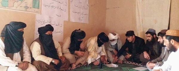 امضا توافق نامه بین نمایندگان معارف طالبان و ریاست معارف ولایت هلمند - اسپوتنیک افغانستان  