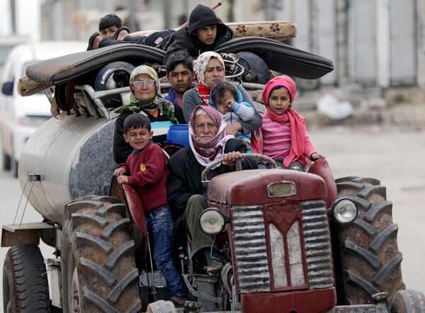 مردم در حال فرار از خانه‌هایشان – عفرین، سوریه - اسپوتنیک افغانستان  