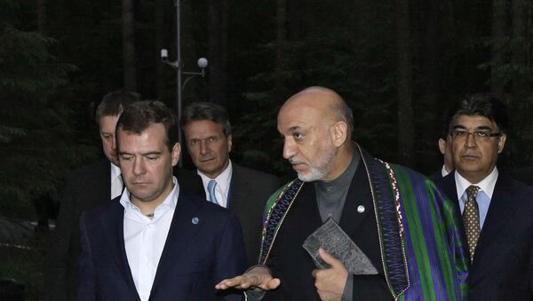 کرزی جهت شرکت در کنفرانس امنیت بین‌المللی، عازم روسیه شد - اسپوتنیک افغانستان  