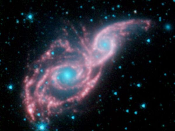 کهکشان های NGC 2207 و IC 2163 - اسپوتنیک افغانستان  