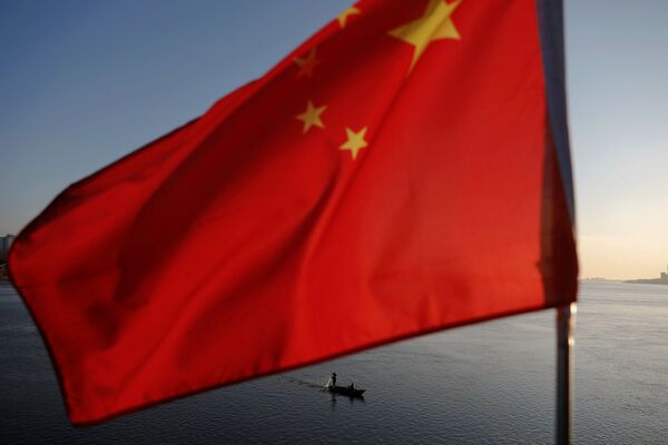 ماهیگیر کوریای شمالی در زیر پرچم چین - مرز چین و کوریای شمالی - اسپوتنیک افغانستان  