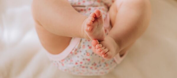 Младенец в подгузнике - اسپوتنیک افغانستان  