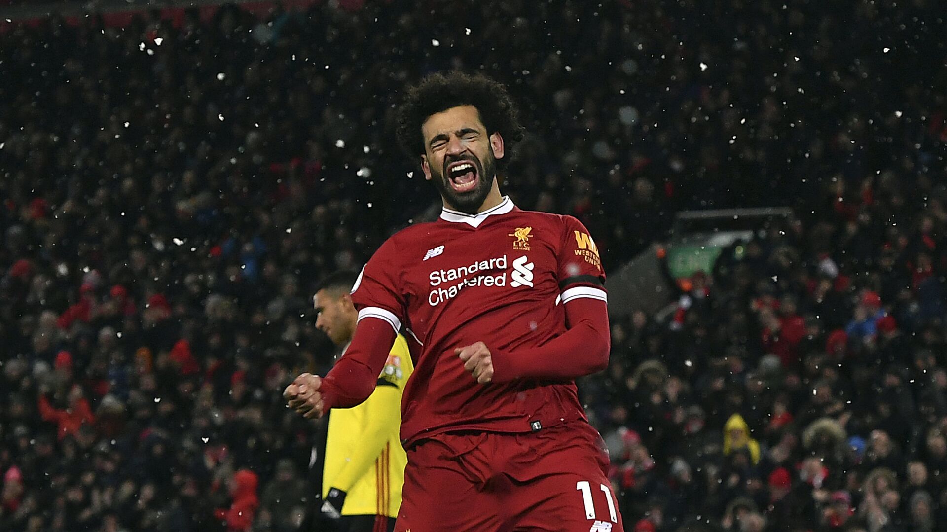 Liverpool's Mohamed Salah celebrates scoring his hat-trick during the English Premier League soccer match between Liverpool and Watford at Anfield, Liverpool, England - اسپوتنیک افغانستان  , 1920, 01.01.2022