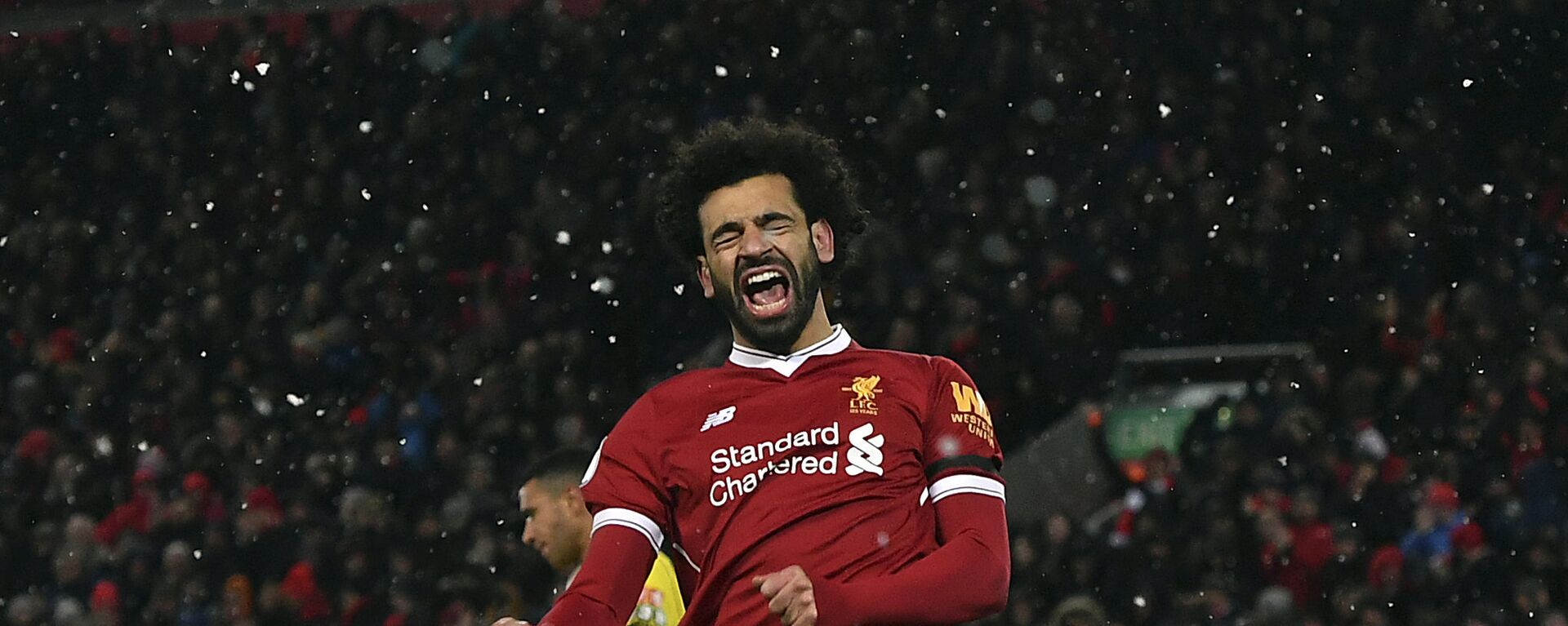 Liverpool's Mohamed Salah celebrates scoring his hat-trick during the English Premier League soccer match between Liverpool and Watford at Anfield, Liverpool, England - اسپوتنیک افغانستان  , 1920, 20.08.2021