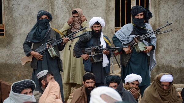 به آتش کشیدن صد ها خانه و دوکان از سوی طالبان - اسپوتنیک افغانستان  