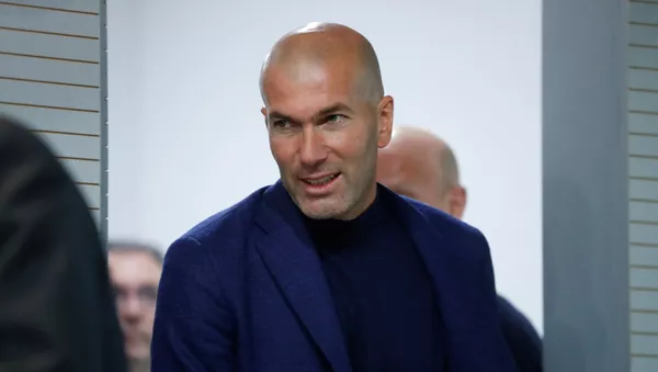 Soccer Football - Real Madrid - Zinedine Zidane Press Conference - Valdebebas, Madrid, Spain - May 31, 2018 Real Madrid coach Zinedine Zidane arrives for the press conference - اسپوتنیک افغانستان  