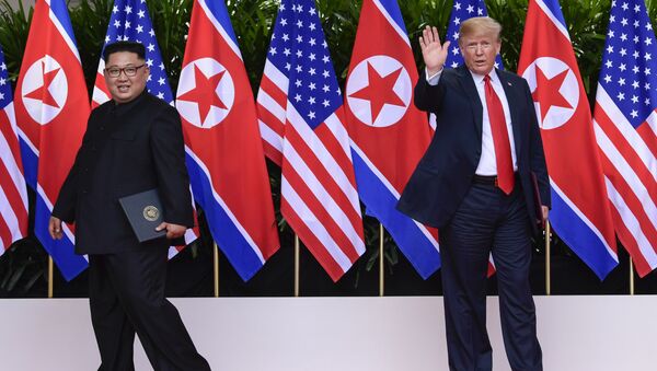 ترامپ و کیم جونگ اون پس از امضای سند نهایی اجلاس سنگاپور - اسپوتنیک افغانستان  