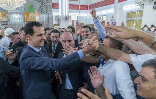 بشار اسد، رئیس جمهور سوریه پس از ادای نماز عید – طرطوس، سوریه - اسپوتنیک افغانستان  
