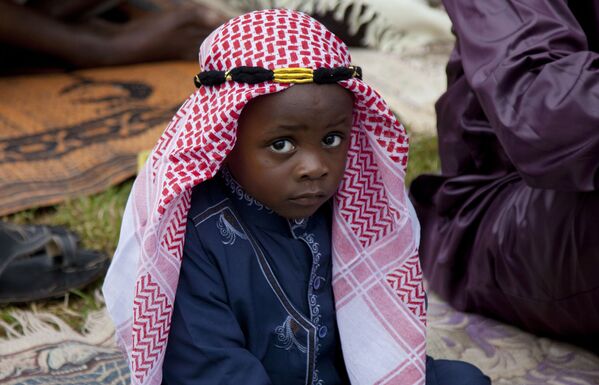 پسر خردسال پس از نماز عید سعید فطر - شهر نایروبی، کنیا - اسپوتنیک افغانستان  