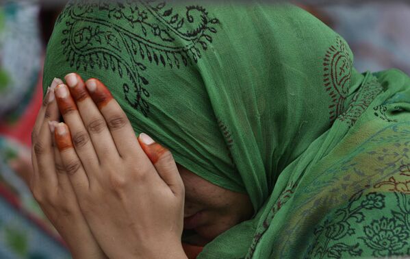 زن پاکستانی در حال دعا – لاهور، پاکستان - اسپوتنیک افغانستان  