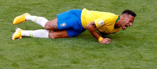 FILE PHOTO: World Cup - Round of 16 - Brazil vs Mexico - Samara Arena, Samara, Russia - July 2, 2018 Brazil's Neymar lies on the pitch after sustaining an injury  - اسپوتنیک افغانستان  
