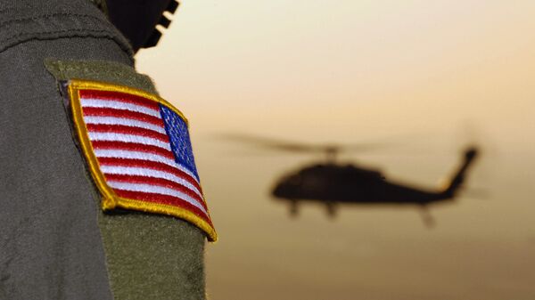 Close-up of a US Flag patch as a US Army (USA) UH-60A Black Hawk (Blackhawk) helicopter  - اسپوتنیک افغانستان  