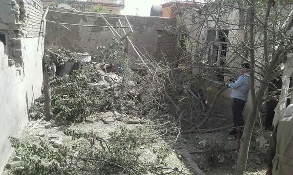منزل مسکونی تخریب شده در نتیجه حمله راکتی به منطقه افشار کابل - اسپوتنیک افغانستان  