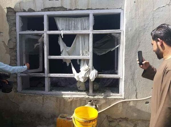 منزل مسکونی تخریب شده در نتیجه حمله راکتی به منطقه افشار کابل - اسپوتنیک افغانستان  