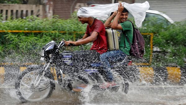 بارندگی شدید در هند جان بیش از 100 نفر را گرفت - اسپوتنیک افغانستان  
