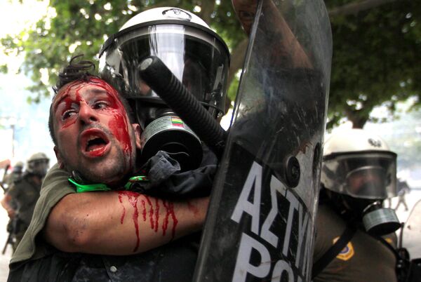 درگیری میان پولیس و معترضین – آتن، جون ۲۰۱۱ - اسپوتنیک افغانستان  