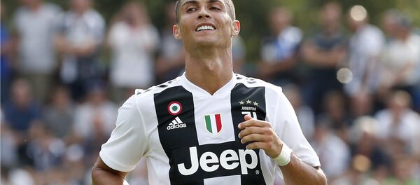 Juventus' Cristiano Ronaldo smiles during a friendly soccer match between the Juventus A and B teams, in Villar Perosa, near Turin, Italy, Sunday, Aug.12, 2018 Juventus' Cristiano Ronaldo smiles during a friendly soccer match between the Juventus A and B teams, in Villar Perosa, near Turin, Italy, Sunday, Aug.12, 2018 - اسپوتنیک افغانستان