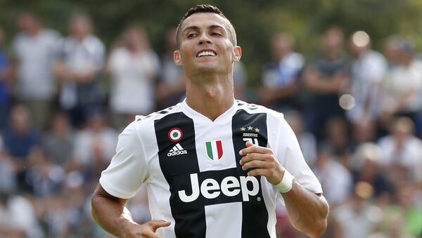 Juventus' Cristiano Ronaldo smiles during a friendly soccer match between the Juventus A and B teams, in Villar Perosa, near Turin, Italy, Sunday, Aug.12, 2018 - اسپوتنیک افغانستان  