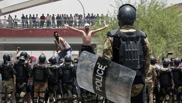 تظاهرات در بغداد یک کشته و ۲۰۰ زخمی بر جا گذاشت - اسپوتنیک افغانستان  