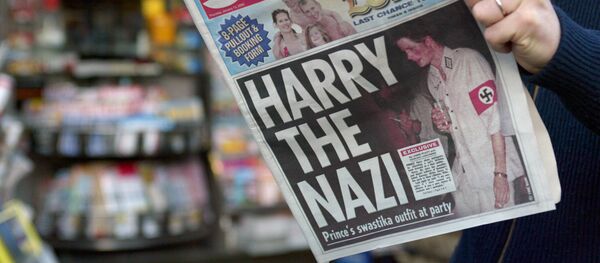 Принц Гарри в военной форме времени нацистской Германии на первой странице британской газеты Sun  Принц Гарри в военной форме времени нацистской Германии на первой странице британской газеты Sun  - اسپوتنیک افغانستان