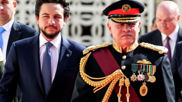 Король Иордании Абдалла II в сопровождении наследного принца Хусейна ибн Абдаллы II в Аммане - اسپوتنیک افغانستان  