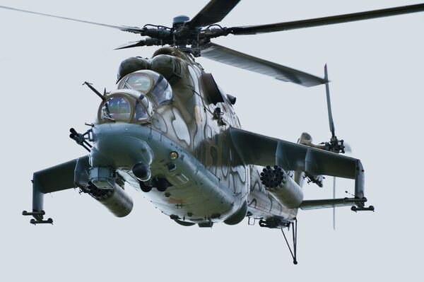 هلیکوپتر میگ-24 در جریان تمرینات مشترک نظامی ضد تروریسم نیروهای مسلح کشورهای عضو سازمان همکاری شانگهای - اسپوتنیک افغانستان  