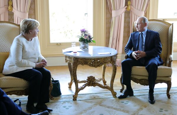 دیدار ولادیمیر پوتین، رئیس جمهور روسیه با آنگلا مرکل، صدر اعظم آلمان - اسپوتنیک افغانستان  