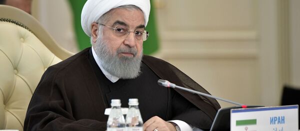 Президент Ирана Хасан Рухани на встрече глав государств-участников V Каспийского саммита в Актау - اسپوتنیک افغانستان  