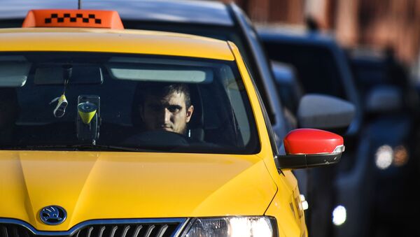 Водитель такси на Бульварном кольце в Москве - اسپوتنیک افغانستان  