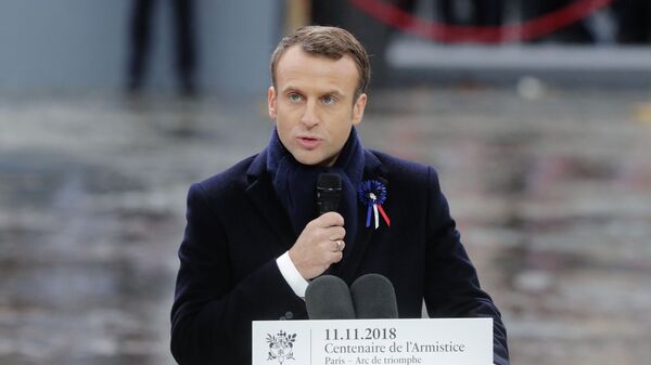 Президент Франции Эммануэль Макрон выступает на мемориальной церемонии у Триумфальной арки в Париже по случаю 100-летия окончания Первой мировой войны - اسپوتنیک افغانستان  