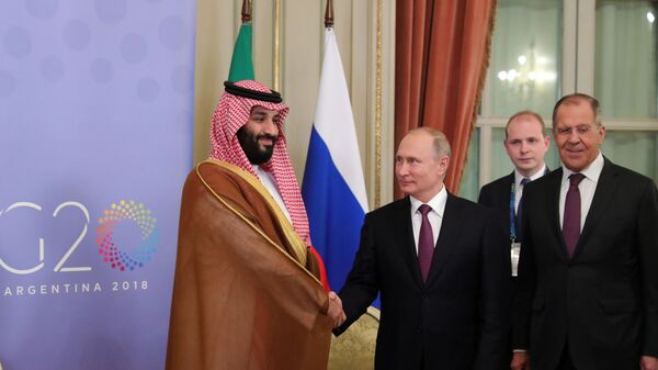 Президент РФ Владимир Путин и наследный принц Саудовской Аравии, министр обороны Королевства Саудовская Аравия Мухаммед бен Сальман аль Сауд (слева) во время встречи на полях саммита Группы двадцати G20 в Буэнос-Айресе - اسپوتنیک افغانستان  