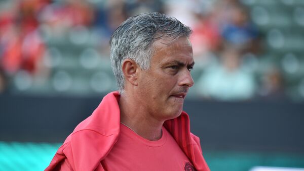 Manchester United's coach Jose Mourinho walks on the pitch before the start of the International Champions Cup match between Manchester United and AC Milan at the StubHub Center in Carson, California, on July 25, 2018 - اسپوتنیک افغانستان  