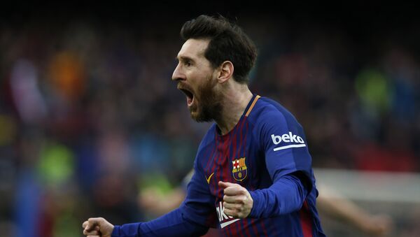 FC Barcelona's Lionel Messi reacts after scoring during the Spanish La Liga soccer match between FC Barcelona and Atletico Madrid at the Camp Nou stadium in Barcelona, Spain, Sunday, March 4, 2018 - اسپوتنیک افغانستان  