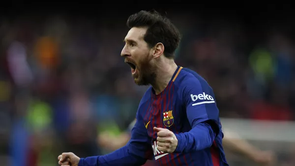 FC Barcelona's Lionel Messi reacts after scoring during the Spanish La Liga soccer match between FC Barcelona and Atletico Madrid at the Camp Nou stadium in Barcelona, Spain, Sunday, March 4, 2018