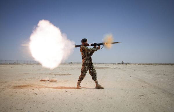 Afghan National Army soldier firing an RPG-7 Afghan National Army soldier firing an RPG-7 - اسپوتنیک افغانستان