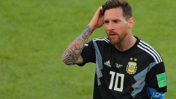 Dejected Argentina's Lionel Messi reacts leaving a pitch after the 1-1 draw at World Cup Group D soccer match between Argentina and Iceland at the Spartak stadium in Moscow, Russia, June 16, 2018 - اسپوتنیک افغانستان  