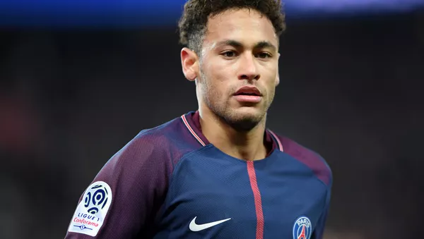 (FILES) In this file photo taken on February 17, 2018 Paris Saint-Germain's Brazilian forward Neymar Jr looks on during the French Ligue 1 football match between Paris Saint-Germain (PSG) and Strasbourg at The Parc des Princes in Paris - اسپوتنیک افغانستان  