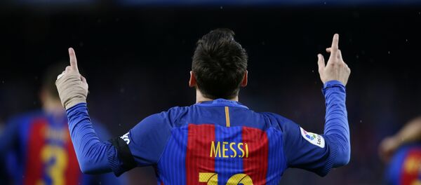 FC Barcelona's Lionel Messi celebrates after scoring during the Spanish La Liga soccer match between FC Barcelona and Sevilla at the Camp Nou stadium in Barcelona, Spain, Wednesday, April 5, 2017 FC Barcelona's Lionel Messi celebrates after scoring during the Spanish La Liga soccer match between FC Barcelona and Sevilla at the Camp Nou stadium in Barcelona, Spain, Wednesday, April 5, 2017 - اسپوتنیک افغانستان