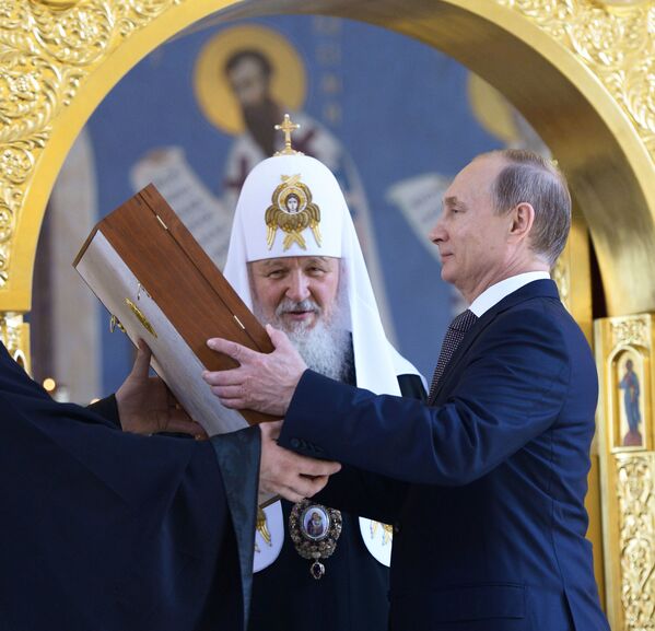 ولادیمیر پوتین، رئیس جمهور روسیه و کریل، رهبر کلیسای ارتدکس مسکو و سراسر روسیه - اسپوتنیک افغانستان  