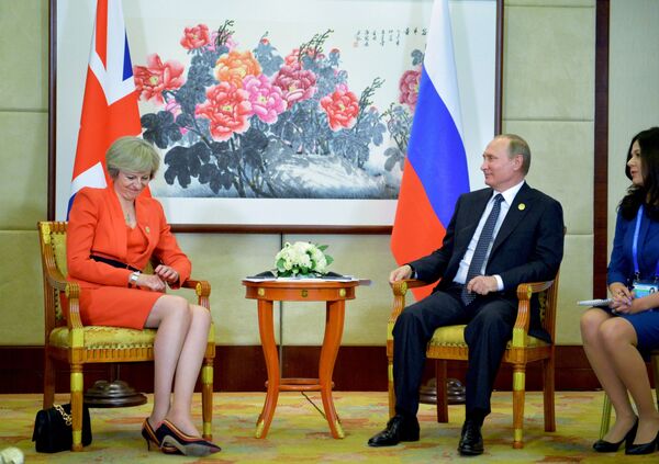 دیدار ولادیمیر پوتین، رئیس جمهور روسیه و ترزا می، نخست وزیر بریتانیا در حاشیه نشست G20 در هانگژو، چین - اسپوتنیک افغانستان  
