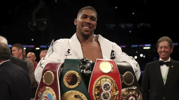Anthony Joshua holds the WBA, IBF and WBO belts after beating Joseph Parker in Cardiff - اسپوتنیک افغانستان  
