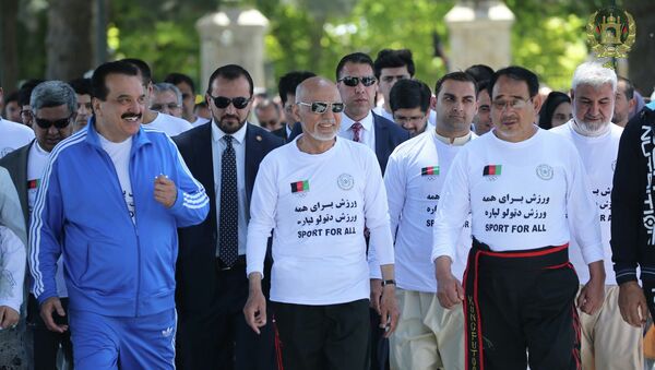 رئیس‌جمهور غنی با عینک دودی و لباس ورزشی - اسپوتنیک افغانستان  