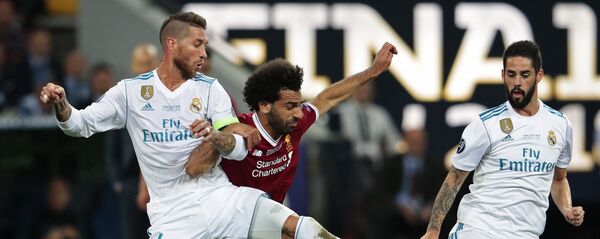 From left: Sergio Ramos from Real Madrid FC (Madrid, Spain), Mohamed Salah from Liverpool FC (Liverpool, England) and Isco from Real Madrid FC during the 2017-2018 UEFA Champions League final match between Liverpool FC and Real Madrid FC From left: Sergio Ramos from Real Madrid FC (Madrid, Spain), Mohamed Salah from Liverpool FC (Liverpool, England) and Isco from Real Madrid FC during the 2017-2018 UEFA Champions League final match between Liverpool FC and Real Madrid FC - اسپوتنیک افغانستان