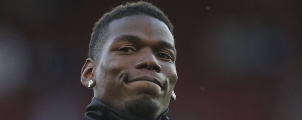 Manchester United's Paul Pogba applauds the fans as he takes part in the warm up prior to the start of the English Premier League soccer match between Manchester United and Leicester City at Old Trafford, in Manchester, England, Friday, Aug. 10, 2018 Manchester United's Paul Pogba applauds the fans as he takes part in the warm up prior to the start of the English Premier League soccer match between Manchester United and Leicester City at Old Trafford, in Manchester, England, Friday, Aug. 10, 2018 - اسپوتنیک افغانستان