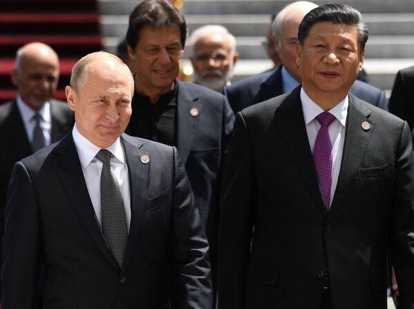 ولادیمیر پوتین، رئیس جمهور روسیه و شی جین پینگ، رئیس جمهور چین در نشست سران سازمان همکاری های شانگهای - بیشکک - اسپوتنیک افغانستان  