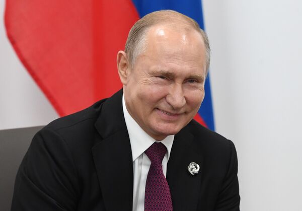 ولادیمیر پوتین، رئیس جمهور روسیه در جریان دیدار با همتای امریکایی خود - اسپوتنیک افغانستان  