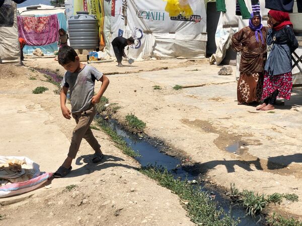 مهاجرین سوریایی - کمپ مهاجرین در ساحل دریایی لیطانی، لبنان - اسپوتنیک افغانستان  